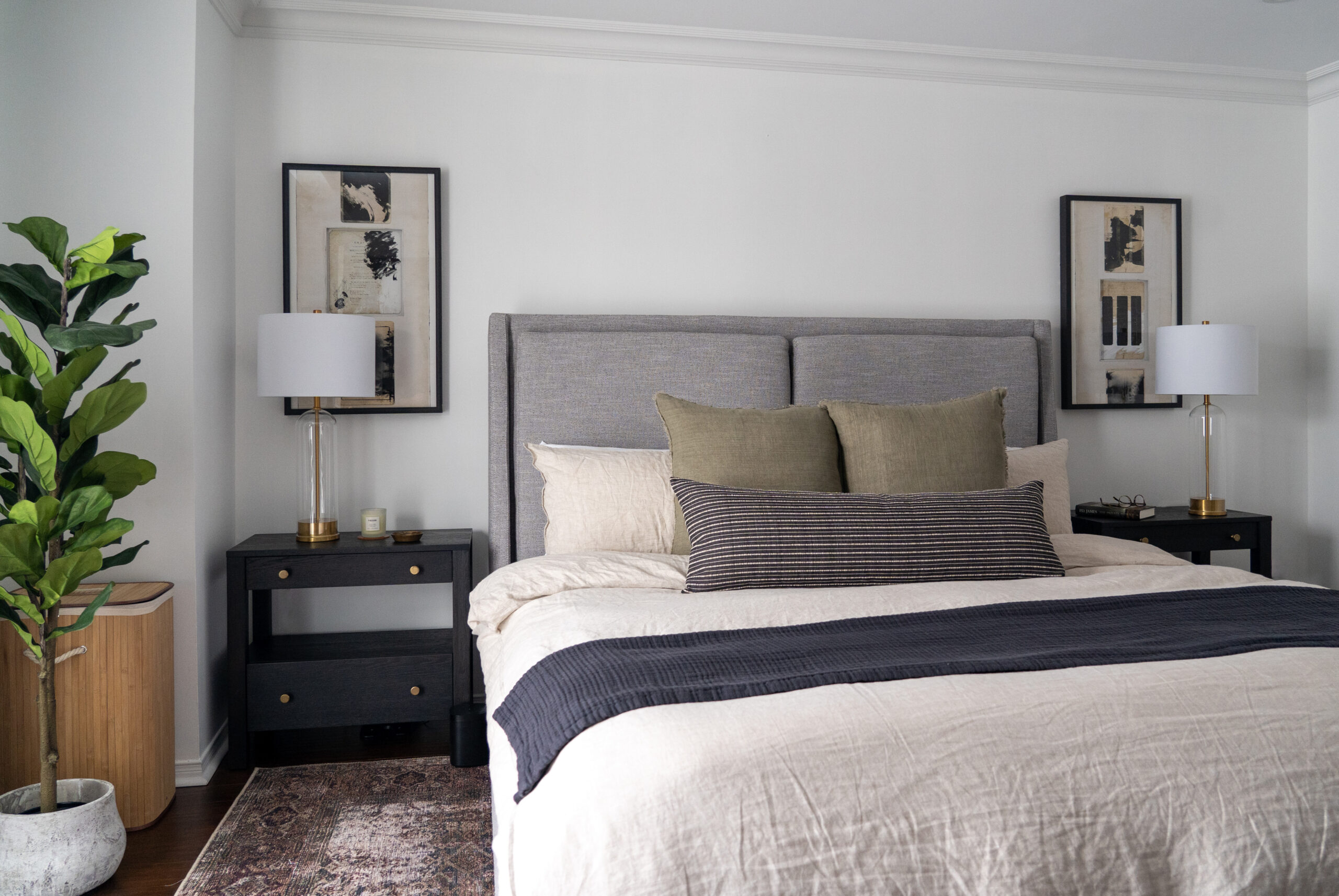 King sized bed with an upholstered headboard and matching nightstands
