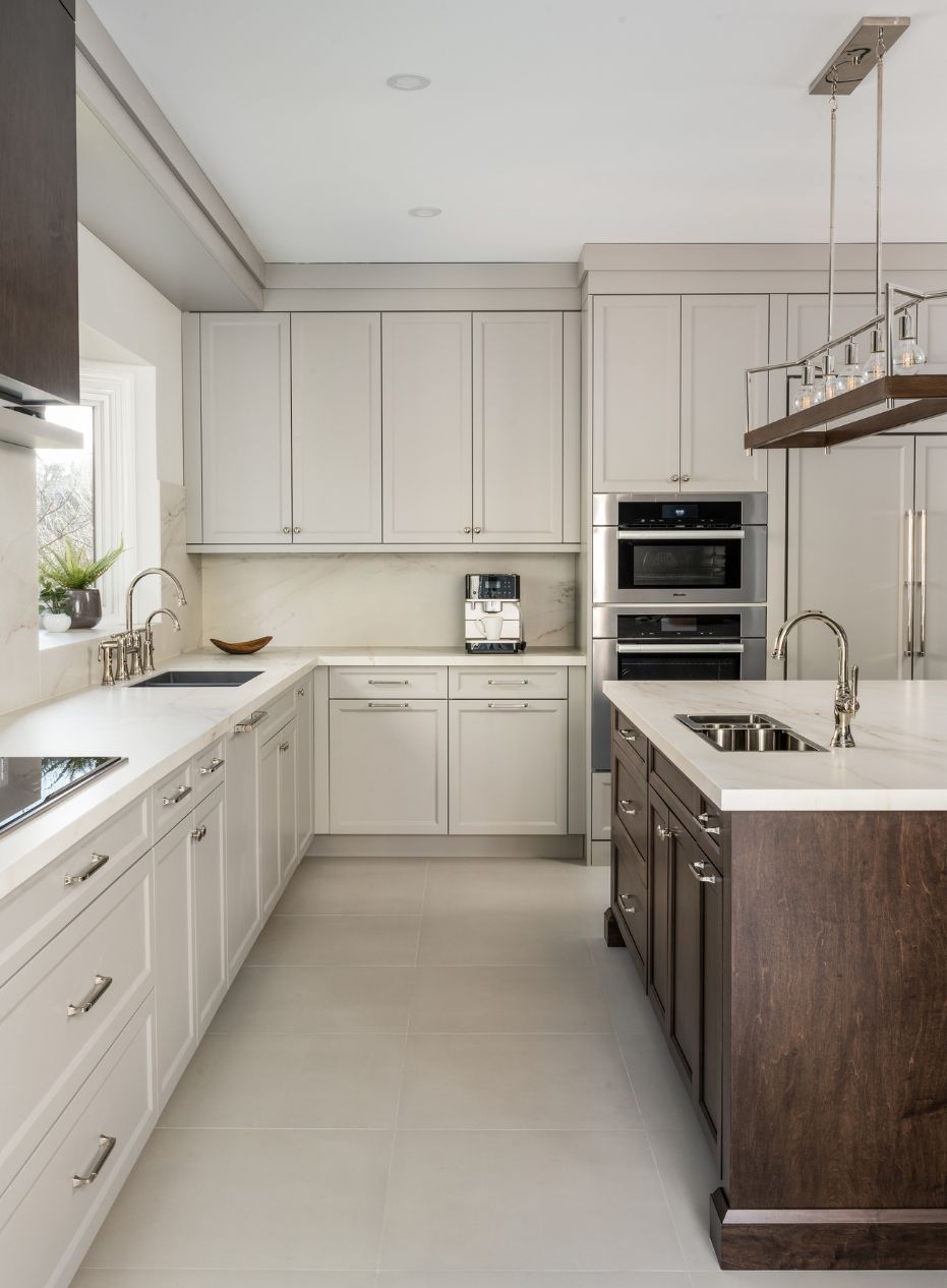Neutral kitchen with mushroom cabinets and luxury panel-ready appliances